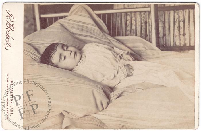 Small child on bed