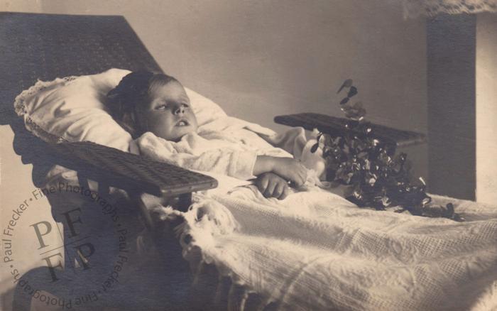 Young boy on a daybed