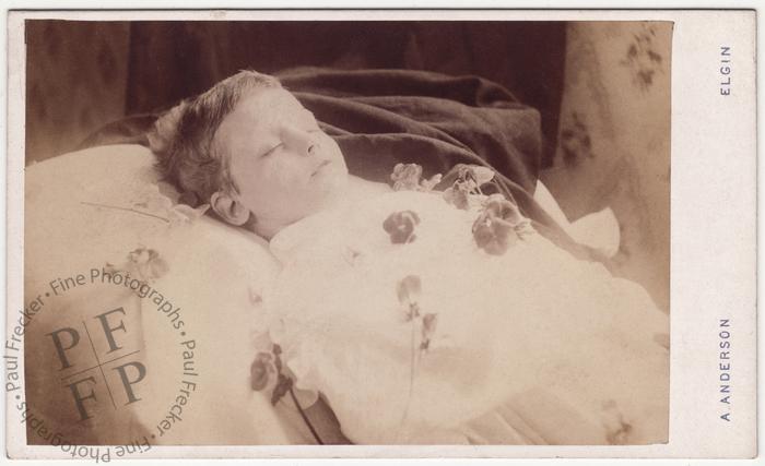 Boy with flowers