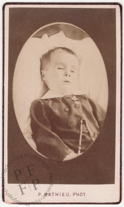 Boy with a rosary