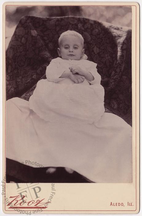Baby with slightly open eyes