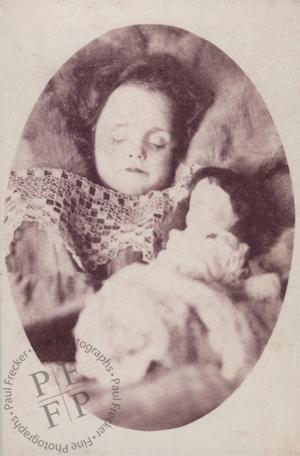 Young girl with a doll