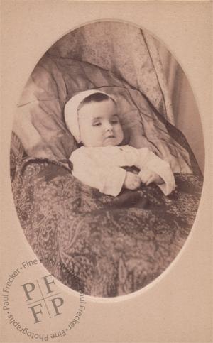 Infant in a baby bonnet