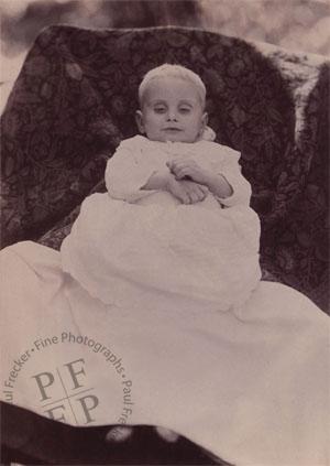 Baby with slightly open eyes