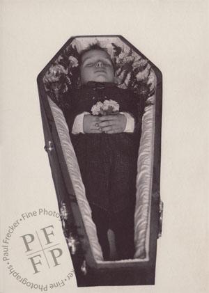 Boy in a coffin