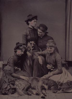 Four young women with a dead dog