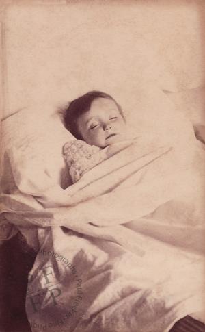 Young boy with a stuffed toy
