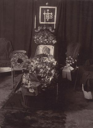 Man in an open-topped coffin